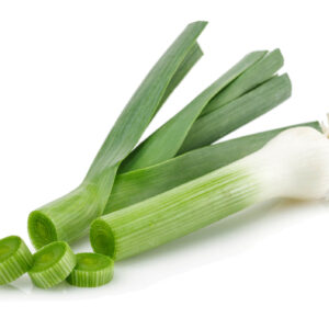 A single Elephant Leek, cut in half to show rings, on a white background